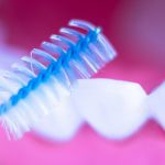 Explore the benefits of interdental brushes for effective plaque removal and optimal oral hygiene between teeth and braces.