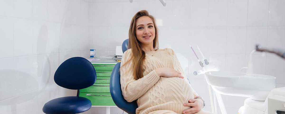 Hamilelikte diş ağrısı ve diş sağlığı önemine dair bir görsel.